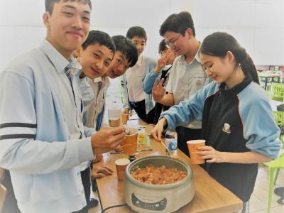 Grade 10 students cooking and tasting original wartime recipes of The Great War.