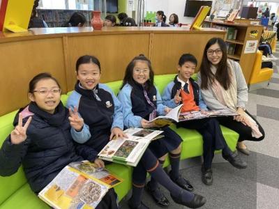 Students read various kinds of books with their friends and teachers