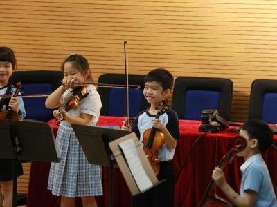 performing for parents, teachers and classmates - Year-end concert