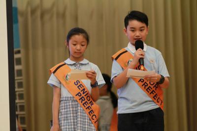 Prefects pledged to demonstrate the spirit of “caring for the buddies and serving the school” in the new academic year.